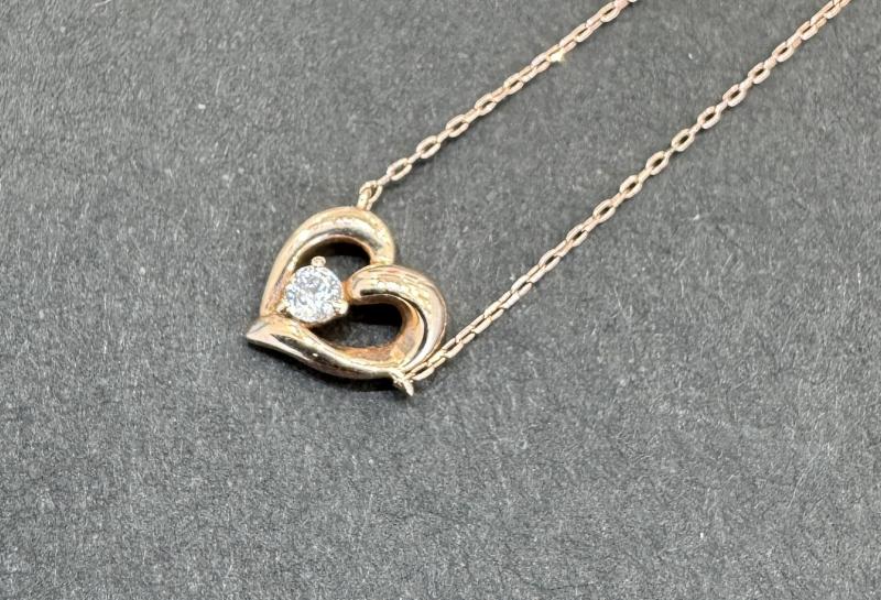 G ネックレス k10 0.9g(石付き）